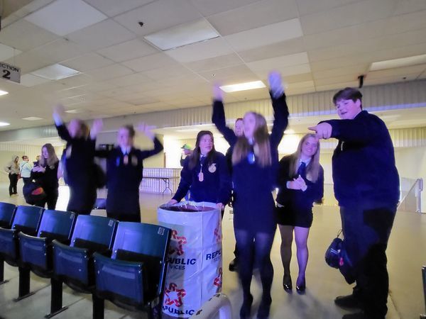 students cheering at ffa conference